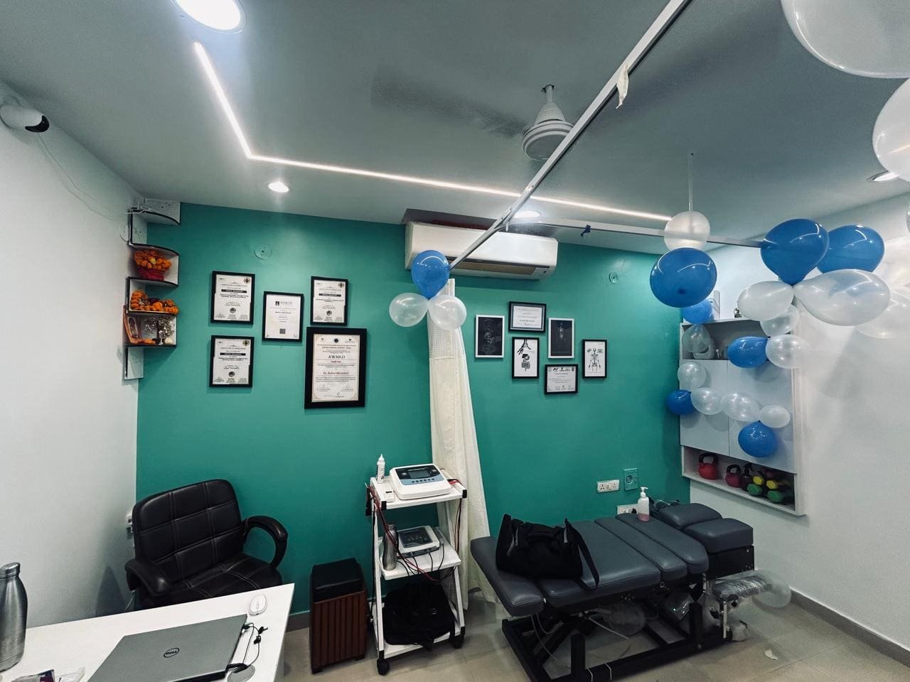 Physiotherapy treatment room with electrotherapy equipment at Symphysio, Sarita Vihar