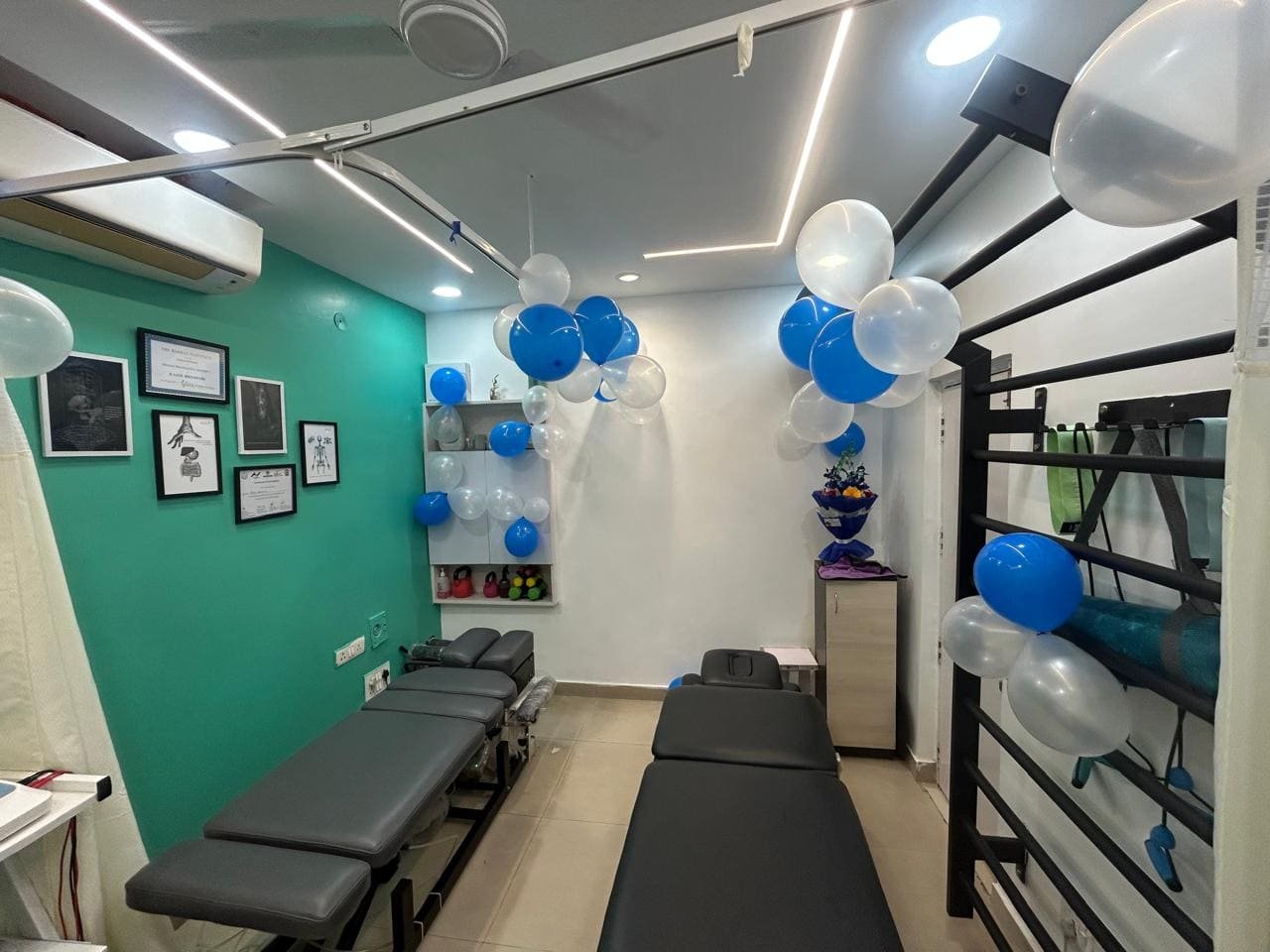 Treatment room with physiotherapy beds at Symphysio clinic, Sarita Vihar