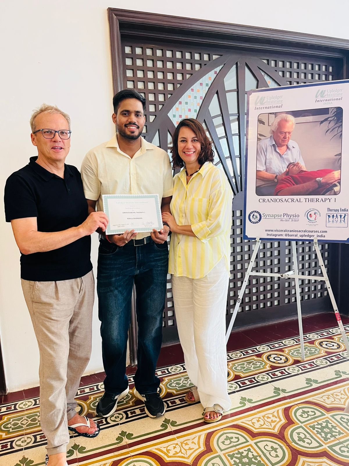 Dr. Rahul Bhandari receiving his Upledger Institute CranioSacral Therapy I certificate